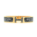 Hermes Guepards Clic Clac 18K Gold Bracelet