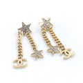 Chanel Star Diamonds Long 18K Gold Earrings