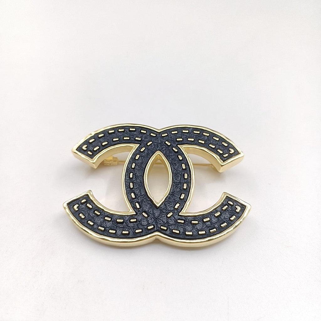 Chanel Black 18K Gold Brooch