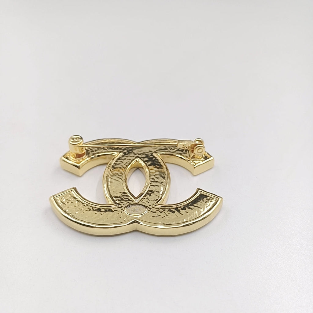 Chanel Black 18K Gold Brooch