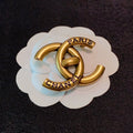 Chanel Paris Gold 18K Gold Brooch