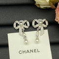 Chanel Butterfly Pearl 18K Gold Earrings